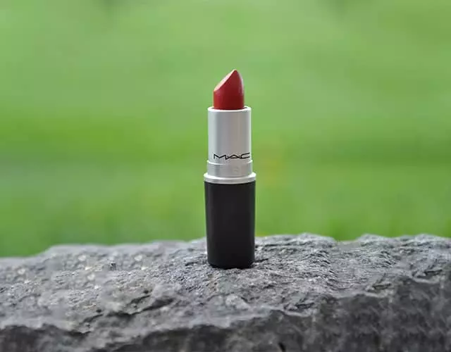 Lipstick photo on grass before background removal