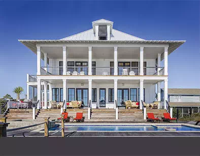 Photo of a large two-story house used as the source