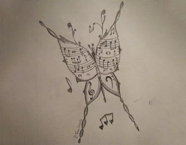 Hand-inked butterfly with music notes drawn on paper