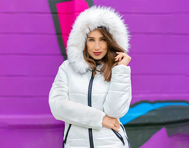 Hooded jacket placed on white before editing