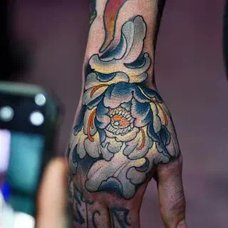 Hand tattoos for men - Tattoo Design Ideas