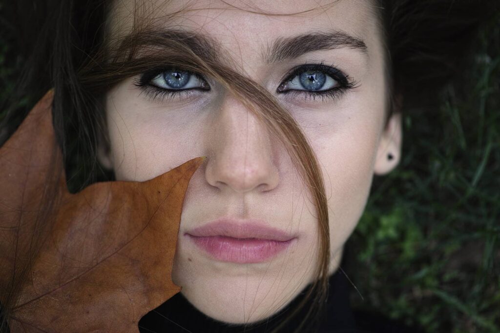 Close-Up portrait with Autumn Leaf