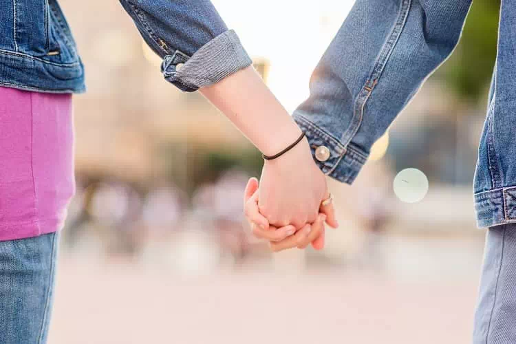 Holding hands Holding hands pose for picture