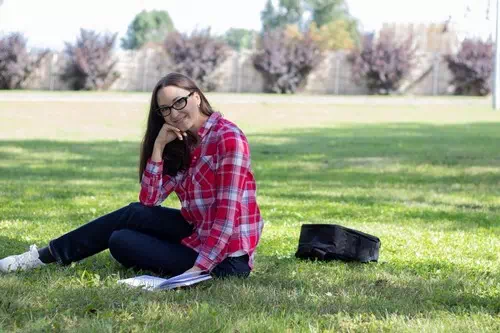 Crouching on the Ground and Looking Back Crouching on the Ground and Looking Back