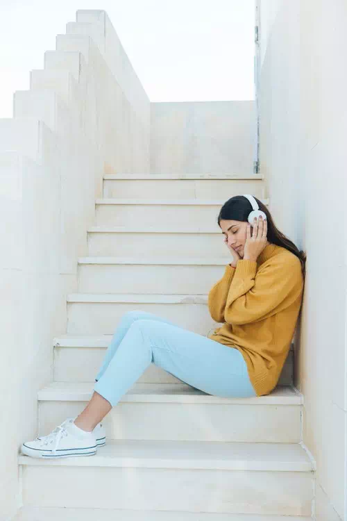 Sitting on Stairs with a Relaxed Pose Sitting on Stairs with a Relaxed Pose